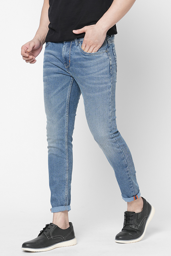 MED BLUE 5 POCKET LOW-RISE TAPERED ANKLE LENGTH JEANS