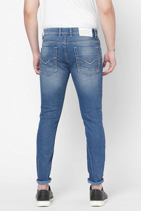 MED BLUE 5 POCKET LOW-RISE TAPERED ANKLE LENGTH JEANS